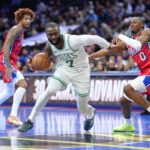 Oct 31, 2025; Philadelphia, Pennsylvania, USA; Boston Celtics forward Jaylen Brown (7) drives against Philadelphia 76ers guard Tyrese Maxey (0) in the first quarter at Xfinity Mobile Arena. Mandatory Credit: Kyle Ross-Imagn Images