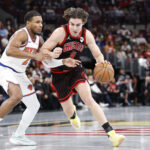 Oct 31, 2025; Chicago, Illinois, USA; Chicago Bulls guard Josh Giddey (3) drives to the basket against New York Knicks guard Miles McBride (2) during the first half at United Center. Mandatory Credit: Kamil Krzaczynski-Imagn Images