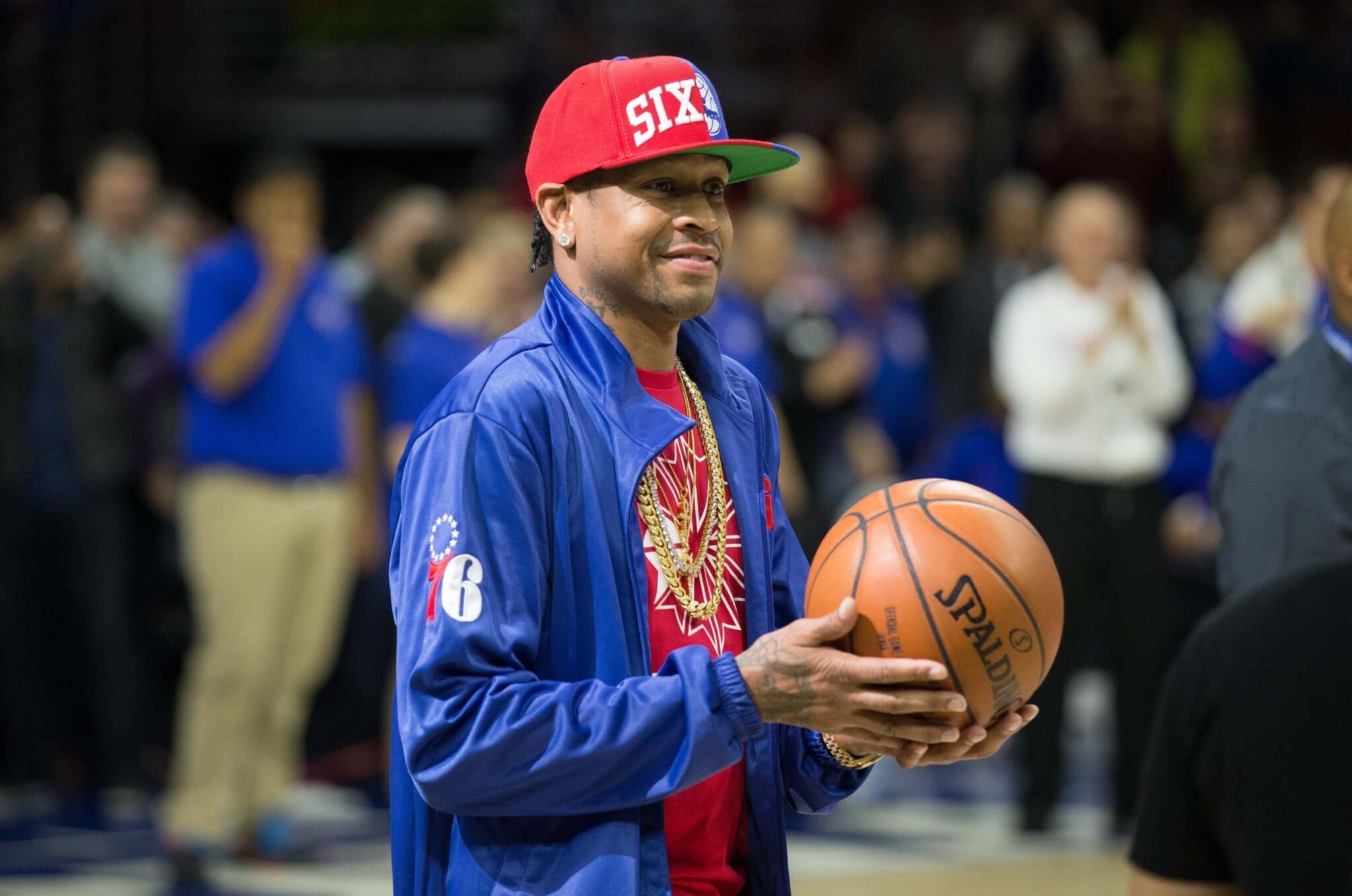 Apr 8, 2016; Philadelphia, PA, USA; Philadelphia 76ers legend Allen Iverson delivers the ball for tip off against the New York Knicks at Wells Fargo Center. The New York Knicks won 109-102. Mandatory Credit: Bill Streicher-Imagn Images