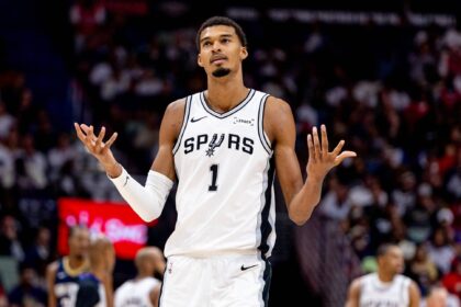 Spurs forward/center Victor Wembanyama reacts to being fouled by Pelicans center Derik Queen (not pictured) during the second half at Smoothie King Center