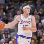 Sacramento, California, USA; Los Angeles Lakers guard Austin Reaves (15) controls the ball against the Sacramento Kings during the second quarter at Golden 1 Center. Mandatory Credit: Ed Szczepanski-Imagn Images