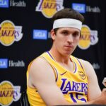 Los Angeles, CA, USA; Los Angeles Lakers guard Austin Reaves (15) during media day at UCLA Health Training Center. Mandatory Credit: Gary A. Vasquez-Imagn Images