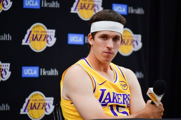 Los Angeles, CA, USA; Los Angeles Lakers guard Austin Reaves (15) during media day at UCLA Health Training Center. Mandatory Credit: Gary A. Vasquez-Imagn Images