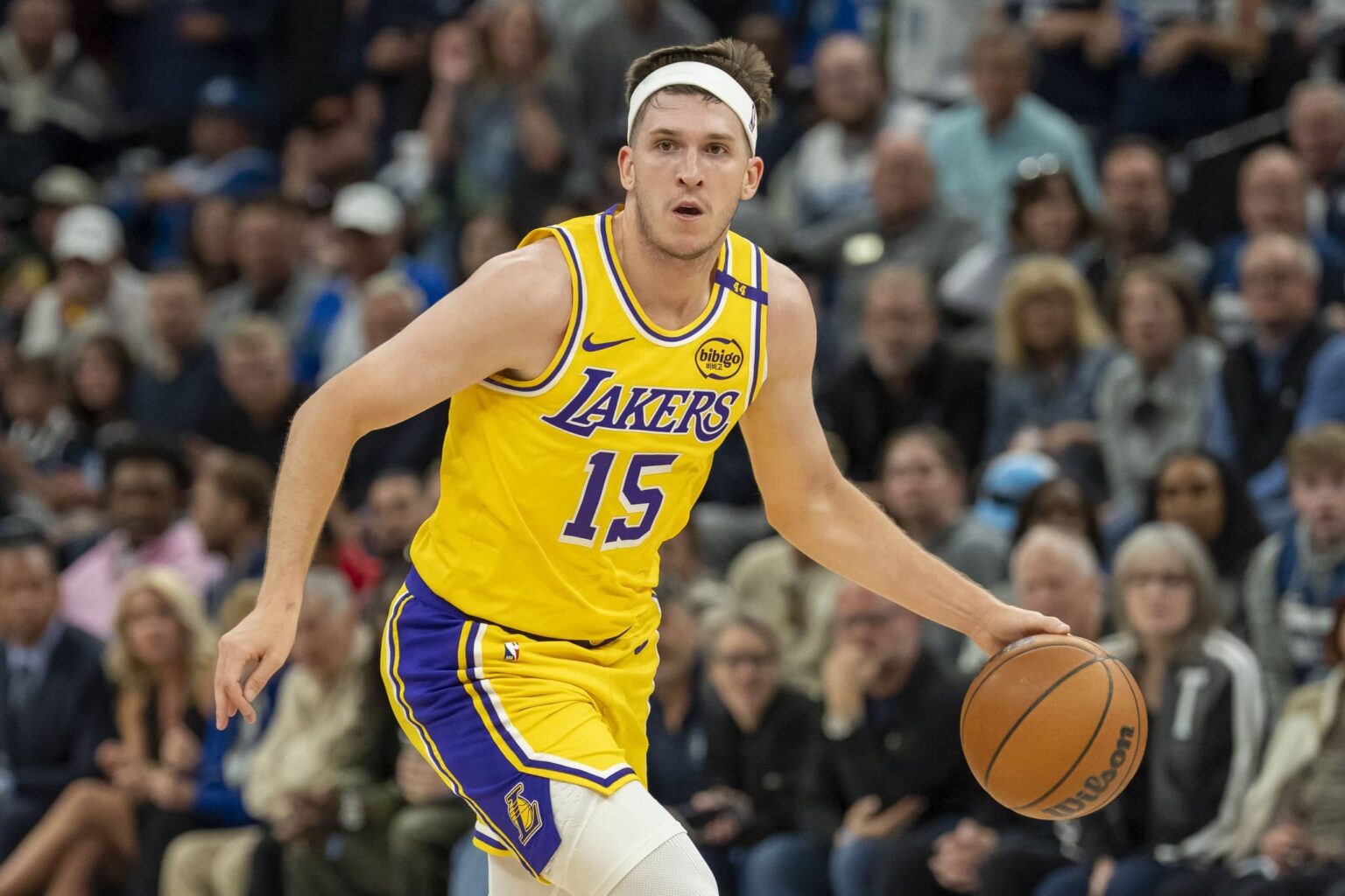 Minneapolis, Minnesota, USA; Los Angeles Lakers guard Austin Reaves (15) dribbles the ball against the Minnesota Timberwolves during Game 3 of the first round of the 2024 NBA Playoffs at Target Center. Mandatory Credit: Jesse Johnson-Imagn Images