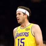 Phoenix, Arizona, USA; Los Angeles Lakers guard Austin Reaves (15) against the Phoenix Suns during an NBA preseason game at Mortgage Matchup Center. Mandatory Credit: Mark J. Rebilas-Imagn Images