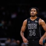 Charlotte, North Carolina, USA; Brooklyn Nets guard Cam Thomas (24) looks on during a break against the Charlotte Hornets during the second quarter at Spectrum Center. Mandatory Credit: Scott Kinser-Imagn Images