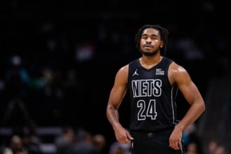 Charlotte, North Carolina, USA; Brooklyn Nets guard Cam Thomas (24) looks on during a break against the Charlotte Hornets during the second quarter at Spectrum Center. Mandatory Credit: Scott Kinser-Imagn Images