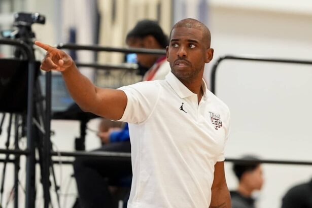 Chris Paul looks on as Team CP3 plays a game against Nightrydas at Nike EYBL at the Memphis Sports & Events Center.