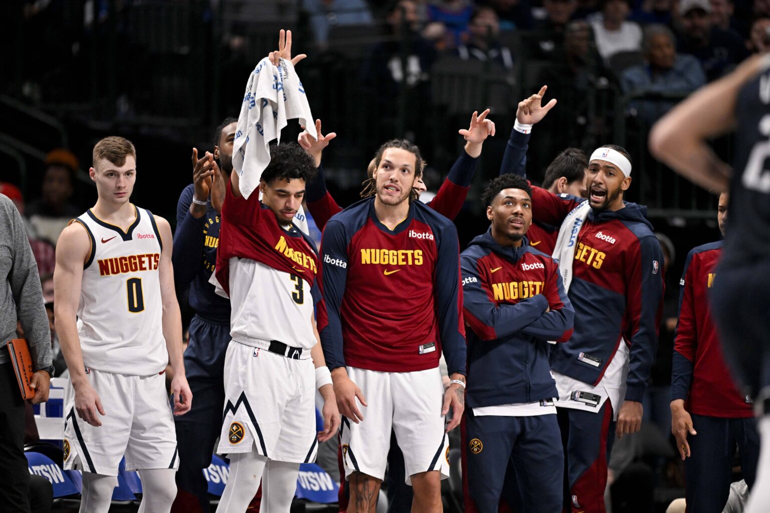 Dallas, Texas, USA; The Denver Nuggets team bench celebrates during the second half of the game against the Dallas Mavericks at the American Airlines Center. Mandatory Credit: Jerome Miron-Imagn Images