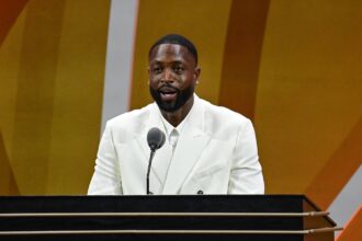 Springfield, MA, USA; Dwyane Wade gives his speech as he is inducted into the 2023 Basketball Hall of Fame at Symphony Hall. Mandatory Credit: Eric Canha-Imagn Images