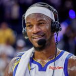 San Francisco, California, USA; Golden State Warriors forward Jimmy Butler III (10) gives an interview after their overtime win against the Denver Nuggets at Chase Center. Mandatory Credit: Bob Kupbens-Imagn Images