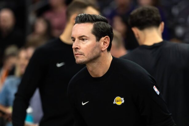Phoenix, Arizona, USA; Los Angeles Lakers head coach JJ Redick against the Phoenix Suns during an NBA preseason game at Mortgage Matchup Center. Mandatory Credit: Mark J. Rebilas-Imagn Images