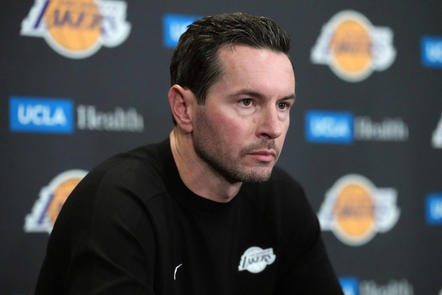 Los Angeles, California, USA; Los Angeles Lakers head coach JJ Redick at a press conference at Crypto.com Arena. Mandatory Credit: Kirby Lee-Imagn Images