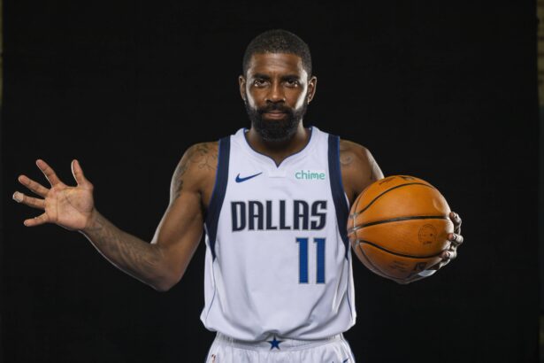 Dallas, TX, USA; Dallas Mavericks guard Kyrie Irving (11) poses for a photo during the Mavericks 2025 media day at the American Airlines Center. Mandatory Credit: Jerome Miron-Imagn Images