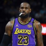 Memphis, Tennessee, USA; Los Angeles Lakers forward LeBron James (23) looks on during the first half against the Memphis Grizzlies at FedExForum. Mandatory Credit: Petre Thomas-Imagn Images
