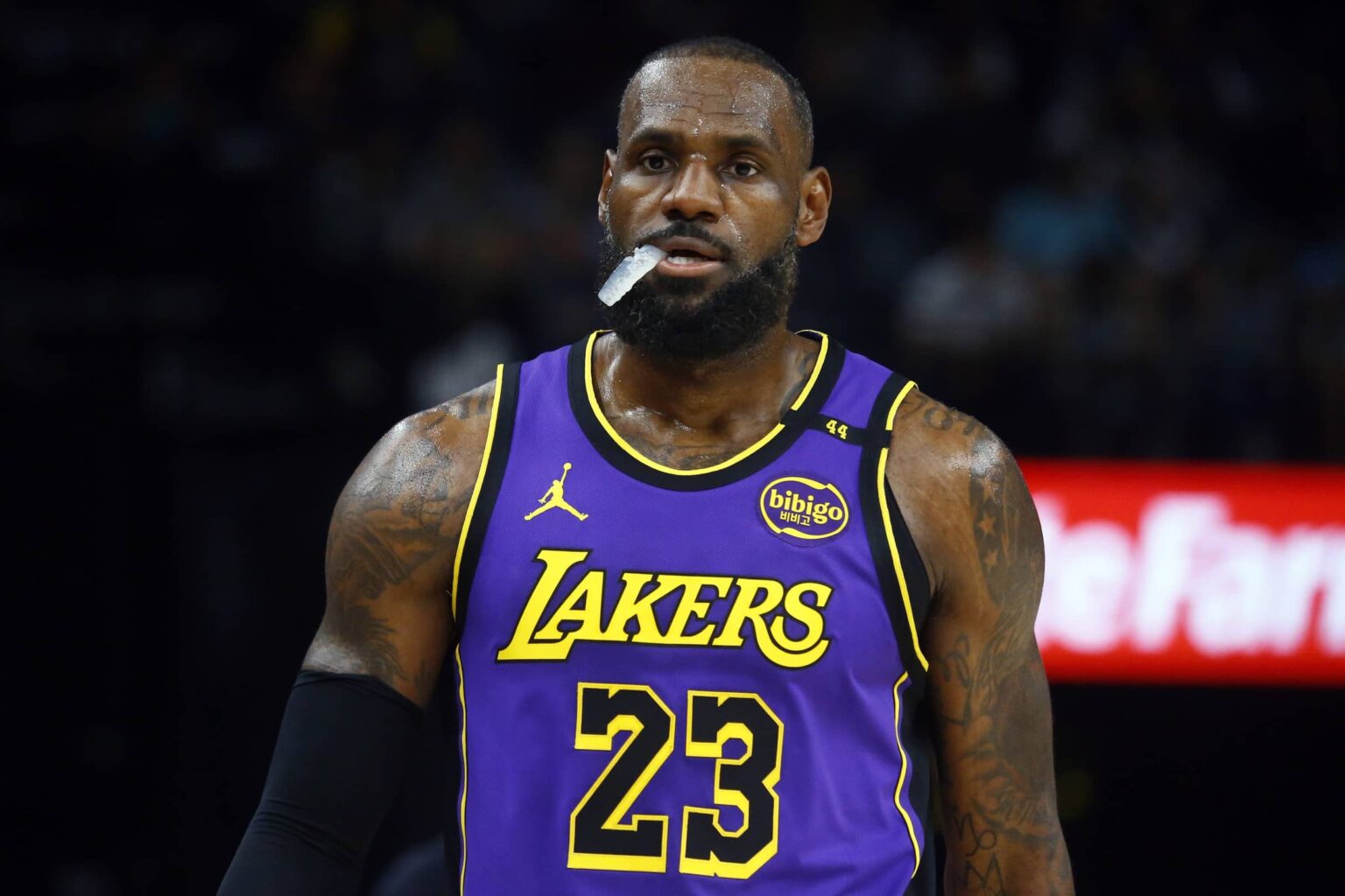 Memphis, Tennessee, USA; Los Angeles Lakers forward LeBron James (23) looks on during the first half against the Memphis Grizzlies at FedExForum. Mandatory Credit: Petre Thomas-Imagn Images