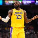 Sacramento, California, USA; Los Angeles Lakers forward LeBron James (23) reacts after missing a shot against the Sacramento Kings in the second quarter at the Golden 1 Center. Mandatory Credit: Cary Edmondson-Imagn Images