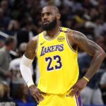 Orlando, Florida, USA; Los Angeles Lakers forward LeBron James (23) looks on against the Orlando Magic in the second quarter at Kia Center. Mandatory Credit: Nathan Ray Seebeck-Imagn Images