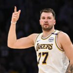 Los Angeles, California, USA; Los Angeles Lakers guard Luka Doncic (77) reacts after scoring against Chicago Bulls during the first half at Crypto.com Arena. Mandatory Credit: Jonathan Hui-Imagn Images