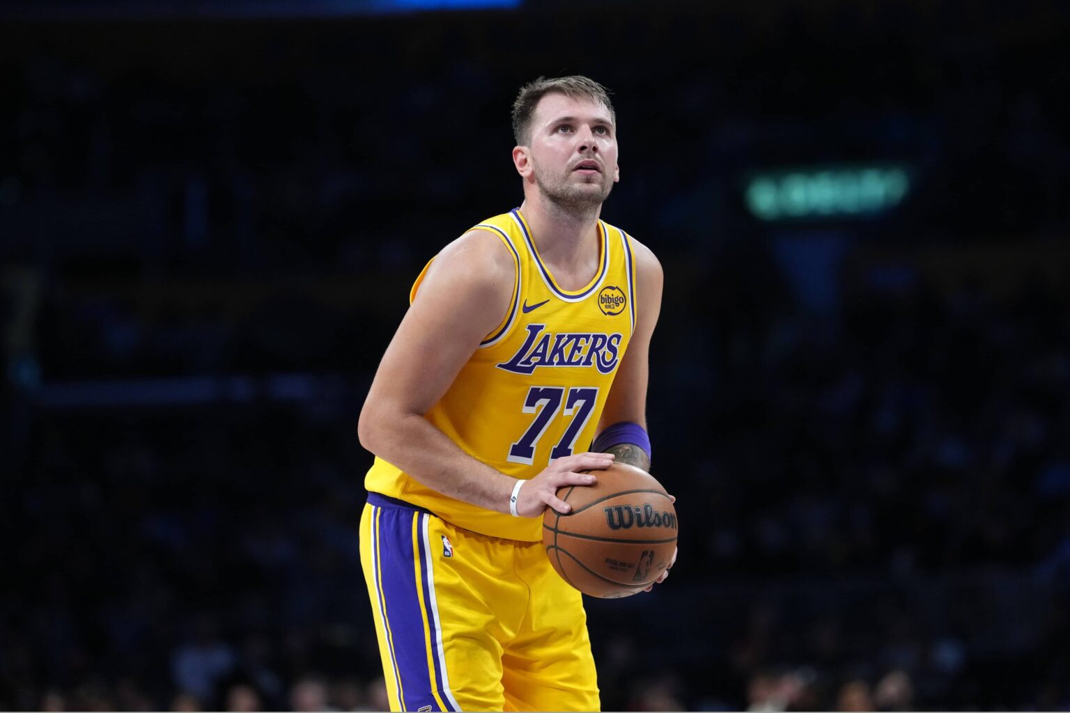 Los Angeles, California, USA; Los Angeles Lakers guard Luka Doncic (77) shoots a free throw in the second half against the Minnesota Timberwolves at Crypto.com Arena. Mandatory Credit: Kirby Lee-Imagn Images