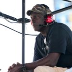Homestead, Florida, USA; 23XI Team co-owner Michael Jordan sits atop of the pitbox during the 4EVER 400 presented by Mobil 1 at Homestead-Miami Speedway. Mandatory Credit: Jasen Vinlove-Imagn Images
