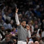 Dallas, Texas, USA; Russell Westbrook celebrates after Denver Nuggets center Nikola Jokic (not pictured) makes a three-point basket against the Dallas Mavericks during the second quarter at the American Airlines Center. Mandatory Credit: Jerome Miron-Imagn Images