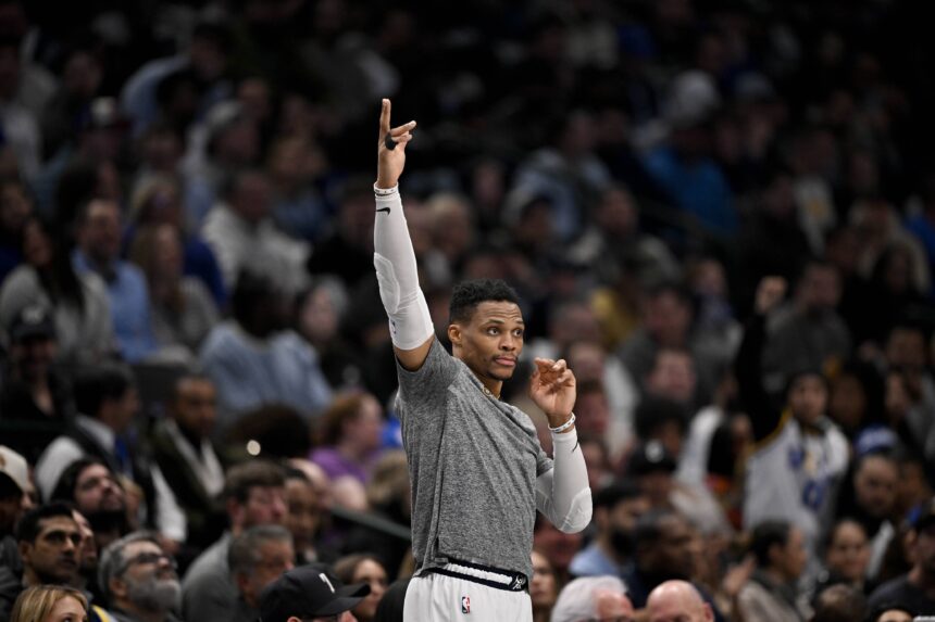Dallas, Texas, USA; Russell Westbrook celebrates after Denver Nuggets center Nikola Jokic (not pictured) makes a three-point basket against the Dallas Mavericks during the second quarter at the American Airlines Center. Mandatory Credit: Jerome Miron-Imagn Images