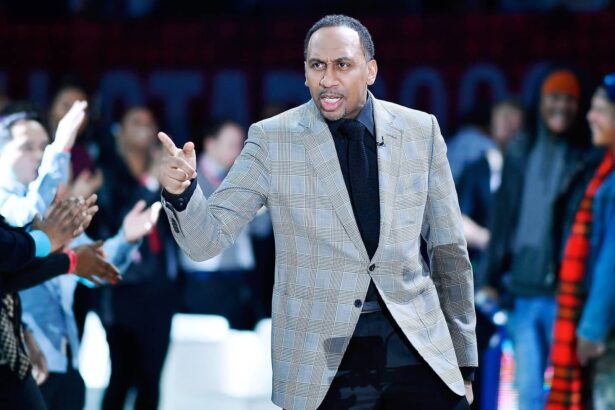 Chicago, Illinois, USA; Team Stephen A. coach Stephen A. Smith gestures during lineup introductions before the NBA All Star-Celebrity Game at Wintrust Arena. Mandatory Credit: Quinn Harris-Imagn Images