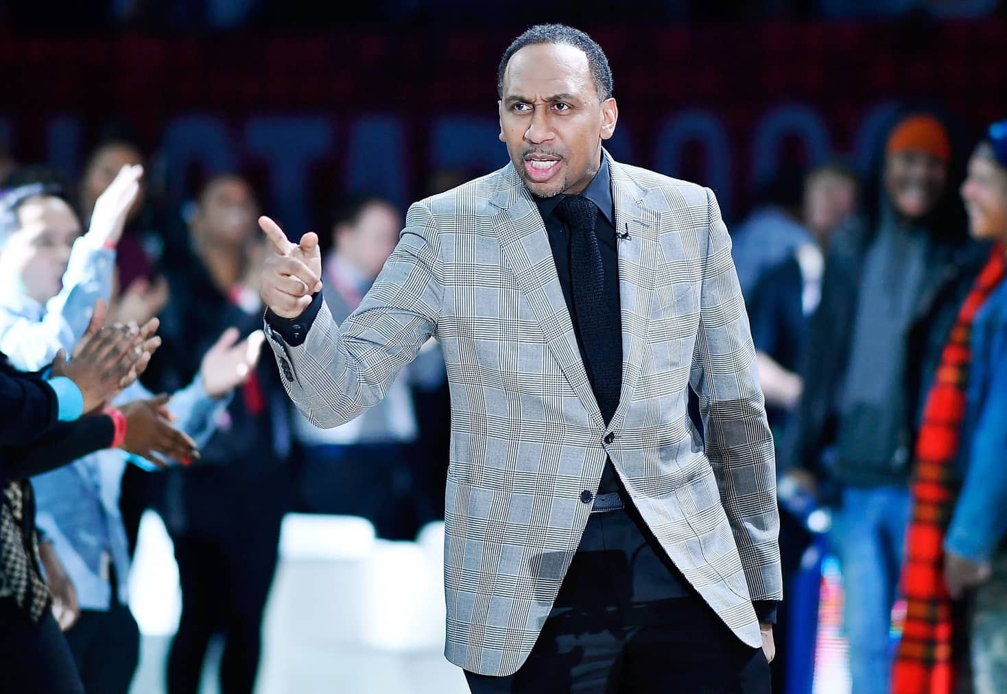 Chicago, Illinois, USA; Team Stephen A. coach Stephen A. Smith gestures during lineup introductions before the NBA All Star-Celebrity Game at Wintrust Arena. Mandatory Credit: Quinn Harris-Imagn Images