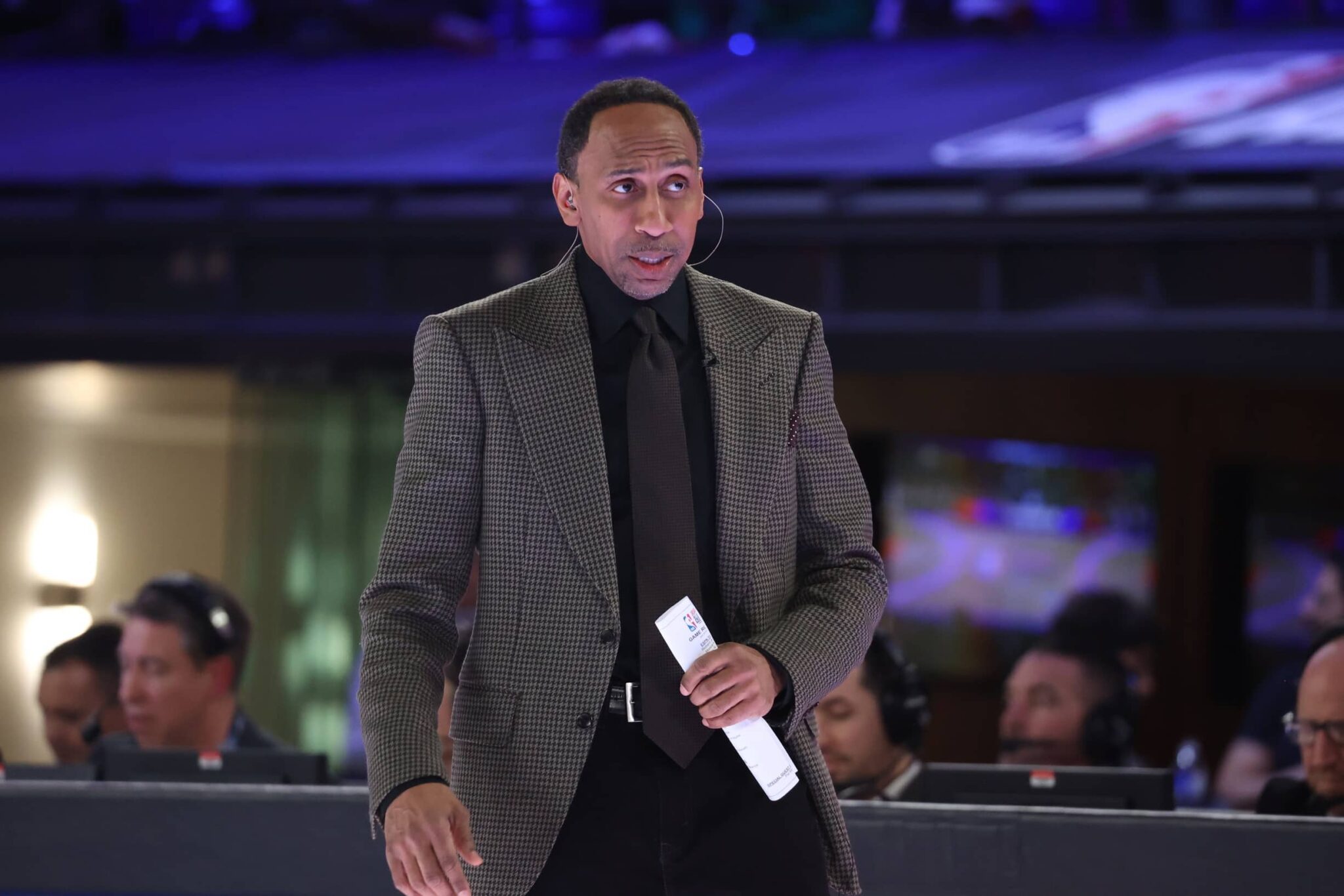Indianapolis, IN, USA; Team Stephen A coach Stephen A. Smith looks on against Team Shannon during the All Star Celebrity Game at Lucas Oil Stadium. Mandatory Credit: Trevor Ruszkowski-Imagn Images