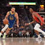 San Francisco, California, USA; Golden State Warriors guard Stephen Curry (30) dribbles past Houston Rockets forward Amen Thompson (1) in the second quarter at the Chase Center. Mandatory Credit: Cary Edmondson-Imagn Images