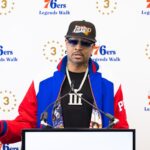 Apr 12, 2024; Camden, NJ, USA; Philadelphia 76ers great Allen Iverson speaks at the podium during the unveiling of a statue honoring him in a ceremony at Penn Medicine Philadelphia 76ers Training Complex. Mandatory Credit: Bill Streicher-Imagn Images