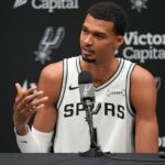 San Antonio, TX, USA; San Antonio Spurs forward-center Victor Wembanyama (1) answers questions from the media during Media Day at Victory Capital Performance Center in San Antonio. Mandatory Credit: Scott Wachter-Imagn Images