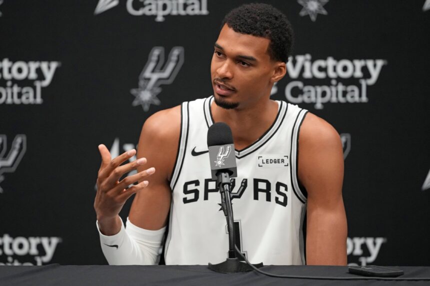 San Antonio, TX, USA; San Antonio Spurs forward-center Victor Wembanyama (1) answers questions from the media during Media Day at Victory Capital Performance Center in San Antonio. Mandatory Credit: Scott Wachter-Imagn Images