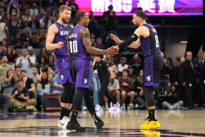 Apr 11, 2025; Sacramento, California, USA; Sacramento Kings forward DeMar DeRozan (10) talks with forward Domantas Sabonis (left) and guard Zach LaVine (😎 during the fourth quarter against the Los Angeles Clippers at Golden 1 Center. Mandatory Credit: Darren Yamashita-Imagn Images