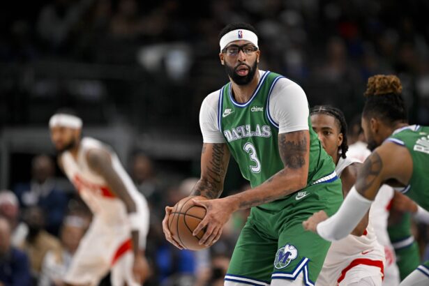 Dallas Mavericks forward Anthony Davis (3) controls the ball during the game between the Mavericks and the Raptors at the American Airlines Center.