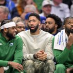 forward Anthony Davis (3) and forward Naji Marshall (13) look on during the first quarter against the Phoenix Suns at the American Airlines Center.