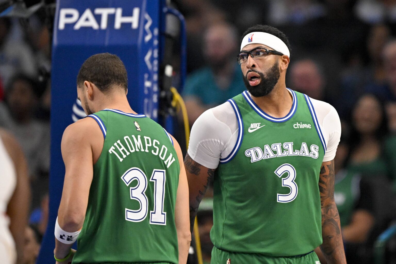 Dallas Mavericks guard Klay Thompson (31) and forward Anthony Davis (3) look on during the game between the Mavericks and the Raptors at the American Airlines Center.
