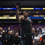 Nov 9, 2025; Sacramento, California, USA; Minnesota Timberwolves guard Anthony Edwards (5) gives his jersey to a young fan during the fourth quarter against the Sacramento Kings at Golden 1 Center. Mandatory Credit: Justine Willard-Imagn Images