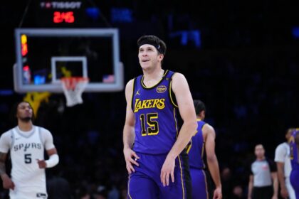 Mar 17, 2025; Los Angeles, California, USA; Los Angeles Lakers guard Austin Reaves (15) reacts in the second half against the San Antonio Spurs at the Crypto.com Arena. Mandatory Credit: Kirby Lee-Imagn Images