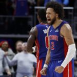 Nov 10, 2025; Detroit, Michigan, USA; Detroit Pistons guard Cade Cunningham (2) celebrates in overtime against the Washington Wizards at Little Caesars Arena. Mandatory Credit: Rick Osentoski-Imagn Images