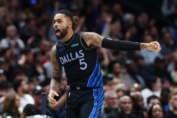 Dallas Mavericks guard D'Angelo Russell (5) reacts after scoring during the second half against the Portland Trail Blazers at American Airlines Center.