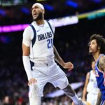 Feb 4, 2025; Philadelphia, Pennsylvania, USA; Dallas Mavericks forward Daniel Gafford (21) reacts after a rebound against the Philadelphia 76ers in the first quarter at Wells Fargo Center. Mandatory Credit: Kyle Ross-Imagn Images