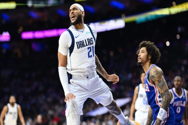 Feb 4, 2025; Philadelphia, Pennsylvania, USA; Dallas Mavericks forward Daniel Gafford (21) reacts after a rebound against the Philadelphia 76ers in the first quarter at Wells Fargo Center. Mandatory Credit: Kyle Ross-Imagn Images