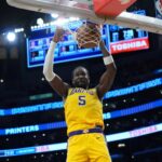 Oct 24, 2025; Los Angeles, California, USA; Los Angeles Lakers center Deandre Ayton (5) dunks the ball in the second half against the Minnesota Timberwolves at Crypto.com Arena. Mandatory Credit: Kirby Lee-Imagn Images
