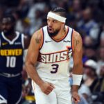 Oct 25, 2025; Denver, Colorado, USA; Phoenix Suns forward Dillon Brooks (3) reacts after making a shot during the first half against the Denver Nuggets at Ball Arena. Mandatory Credit: Christopher Hanewinckel-Imagn Images