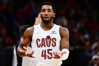 Cleveland Cavaliers guard Donovan Mitchell (45) celebrates after hitting a three point basket against the Los Angeles Clippers during the second half at Rocket Arena.