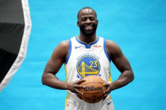 Golden State Warriors forward Draymond Green (23) holds onto the ball during Media Day at the Chase Center.