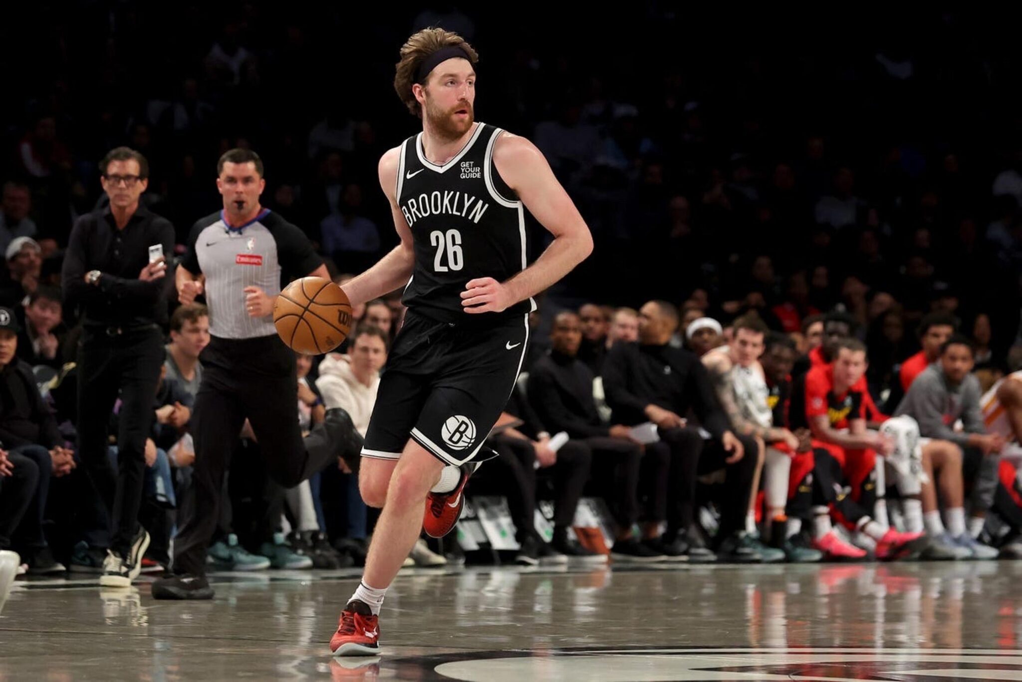 Apr 10, 2025; Brooklyn, New York, USA; Brooklyn Nets forward Drew Timme (26) brings the ball up court against the Atlanta Hawks during the second quarter at Barclays Center. Mandatory Credit: Brad Penner-Imagn Images