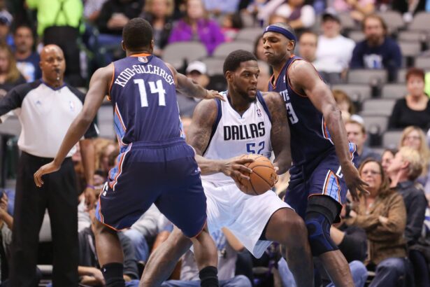 Dallas Mavericks center Eddy Curry (52) makes a move on Charlotte Bobcats center Brendan Haywood (33) during the first quarter at the American Airlines Center.